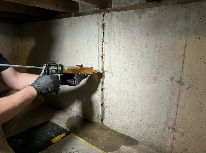 Foundation crack and rod hole repair with epoxy injection